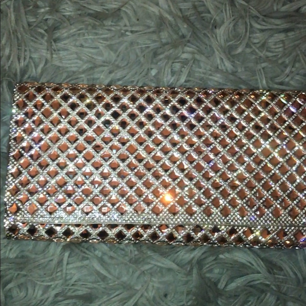 Aldo rose gold clutch.
